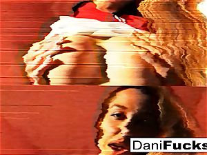 Dani Daniels plays with her amazing boobies and moist vulva