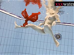 killer super-hot damsel swimming in the pool